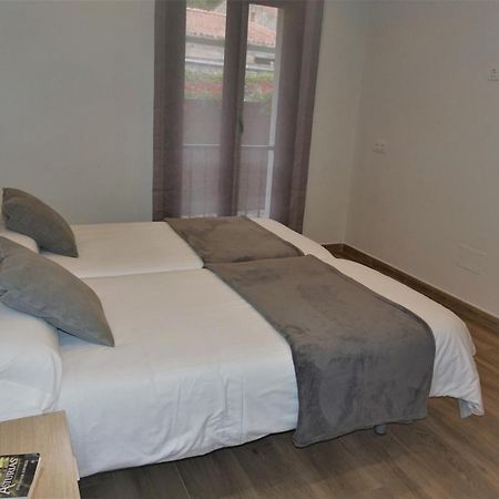 Apartamentos La Playina 利亚内斯 外观 照片