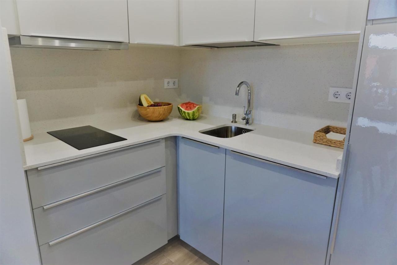 Apartamentos La Playina 利亚内斯 外观 照片